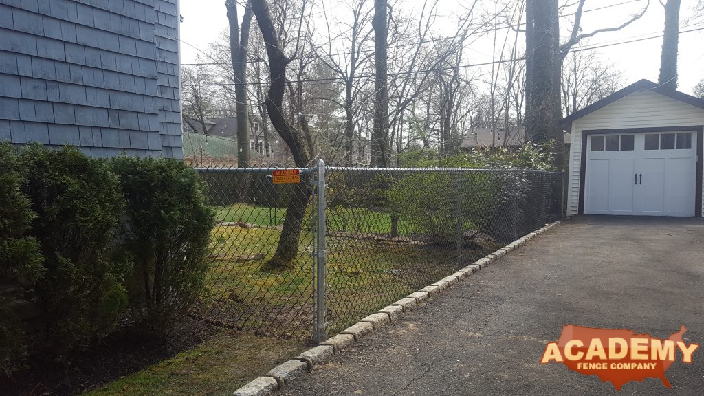 4 foot high black chain link galvanized frame installed by Academy fence Company in Montclair, NJ - Essex County
