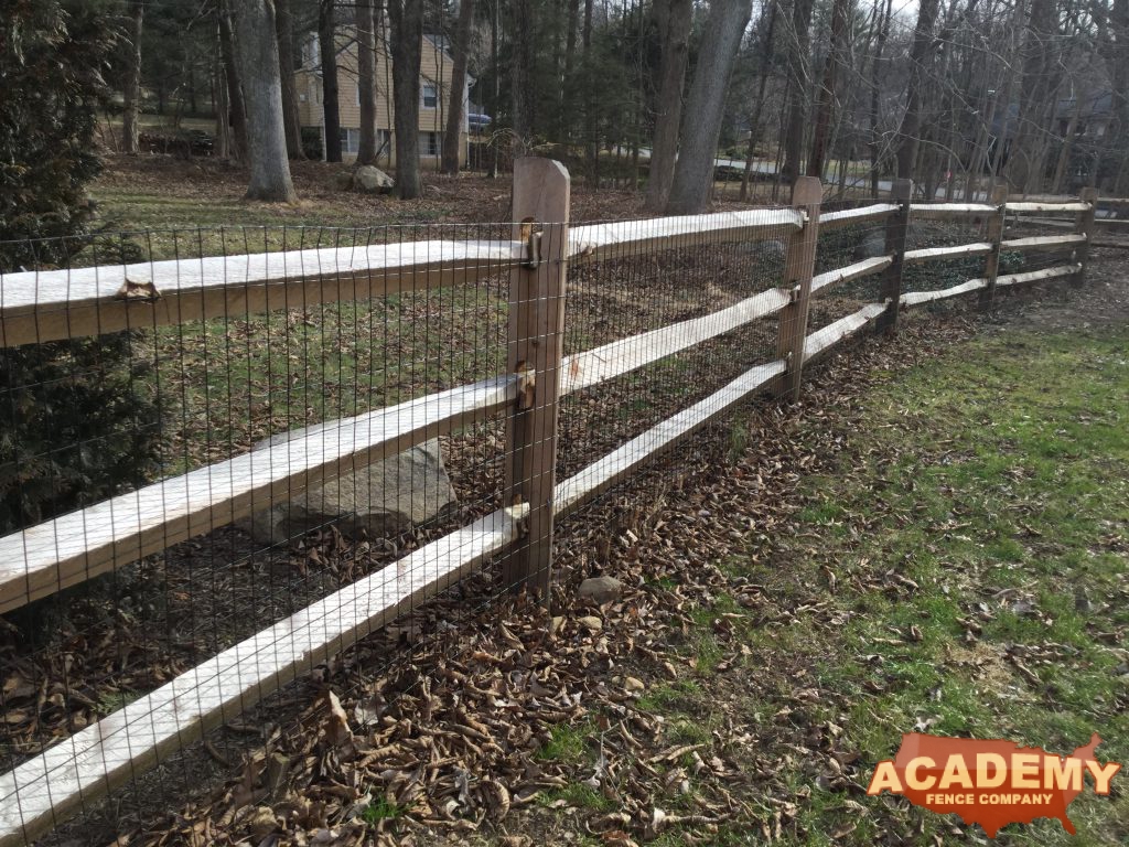 Post and rail with welded wire mesh attached, installed by Academy Fence Company in Denville, NJ.