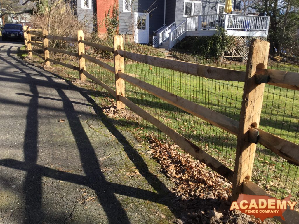 Post and rail with welded wire mesh attached installed by Academy Fence Company in Elizabeth, NJ. Union County